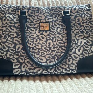 Diane Von Furstenberg blue leopard travel bag